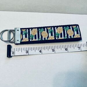 PINEAPPLE RIBBON‎ KEYCHAIN. New without tags.